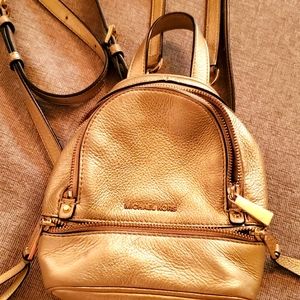 Gold Michael Kors Rhea mini backpack